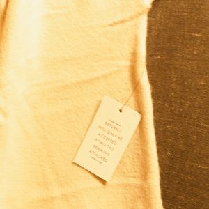 Cold shoulder cream sweater dress